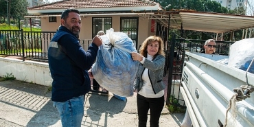 aliagadan-karsiyakaya-iyilik-koprusu-mavi-kapak-kampanyasina-200-kilogramlik-destek.jpg