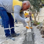 didim-belediyesi-hisar-mahallesi-2463-sokakta-baslatilan-yol-yapim-calismalarini-tamamlandi.jpg