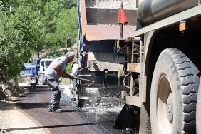 kas-beldibi-ve-sutlegen-grup-yolu-asfaltlaniyor.jpg